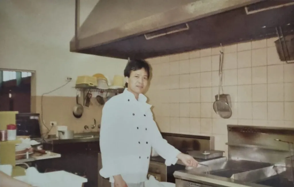 Fai, head chef and co-owner of Hong Kong Restaurant, cooking in the kitchen